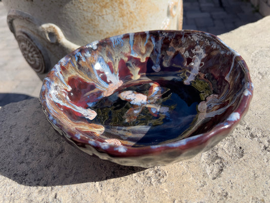 A Pinch Bowl with Drippy Glaze