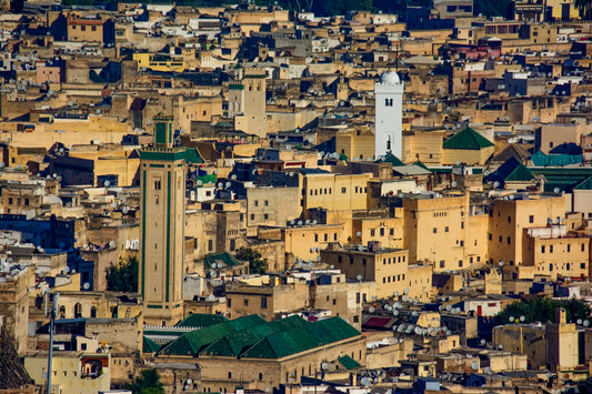 Fes, Morocco — Historic Medina Rooftops and Green-Tiled Minarets