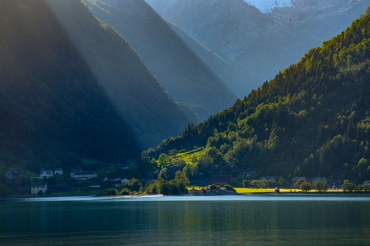 Sunbeams Over a Village on Hardangerfjord, Norway